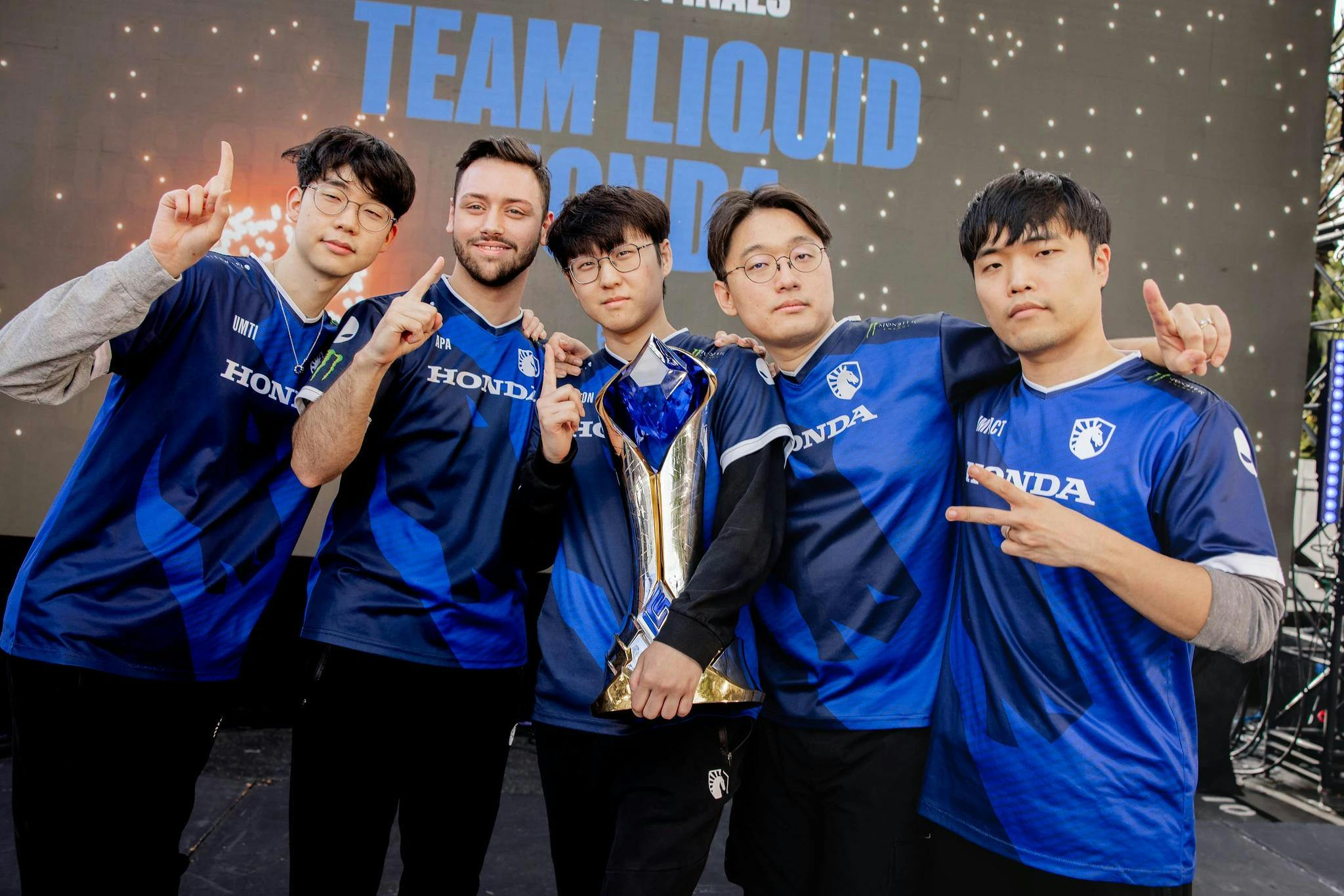 TL's roster with their Spring 2024 trophy. Credit: Colin Young-Wolff/Riot Games