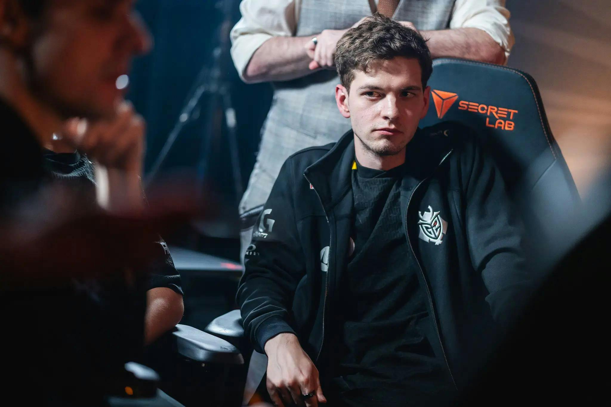 Mikyx, reflecting with his teammates backstage. Credit: Wojciech Wandzel/Riot Games